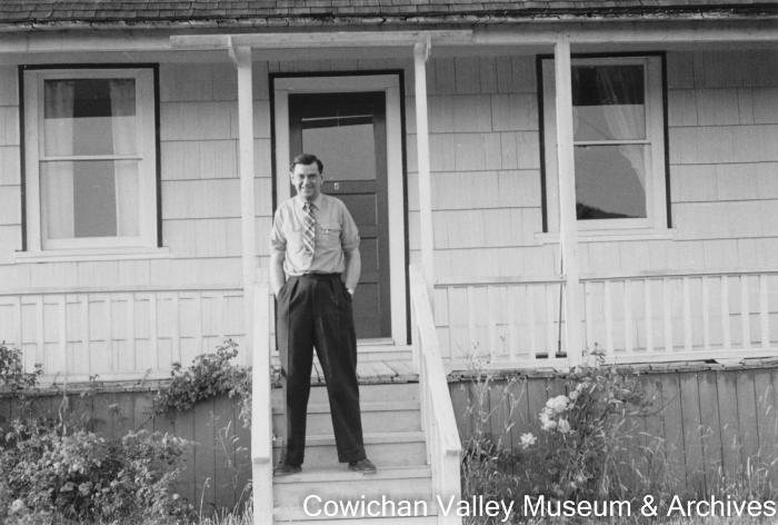[Henry McHemer company controller in front of Mayo Lumber Co. office]