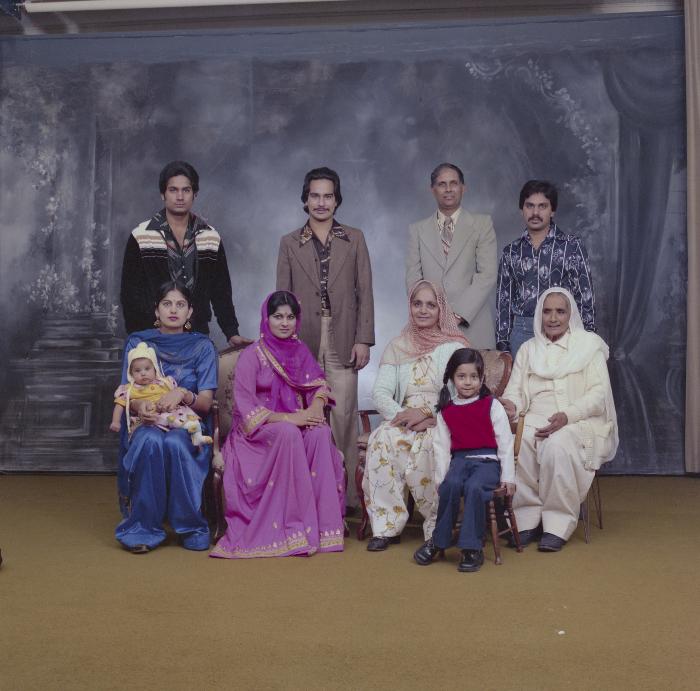 [Portrait of Chindo Sidhu, Iqbal Sandhu and family members at their wedding]