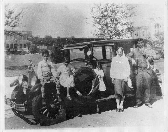 [Group photo of Gurdas Singh Johal and Bhani Kaur Johal with their children]