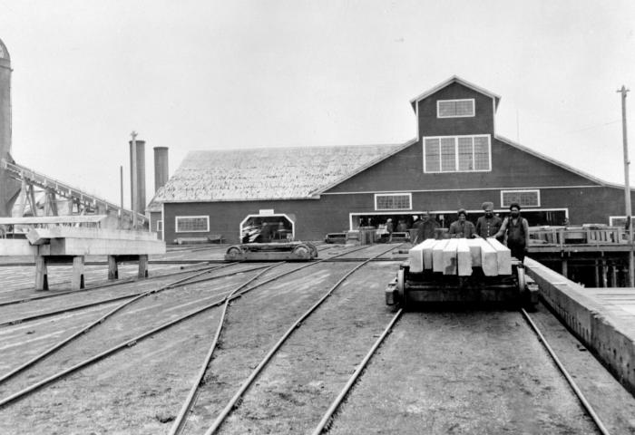 [Photo of lumber miill workers at the Fraser Mills]