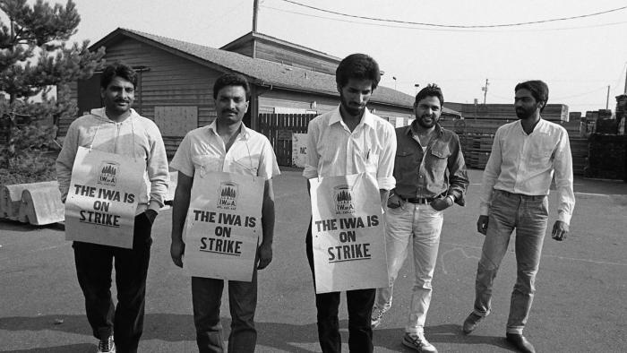[Group photo of members of IWA Local 1-357 walking the picket line at North Mitchell Lumber in Agassiz]