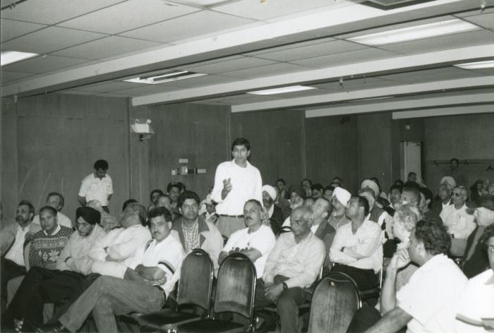 [Photo of International Woodworkers of America (IWA) members at the final membership meeting of Local 1-217]