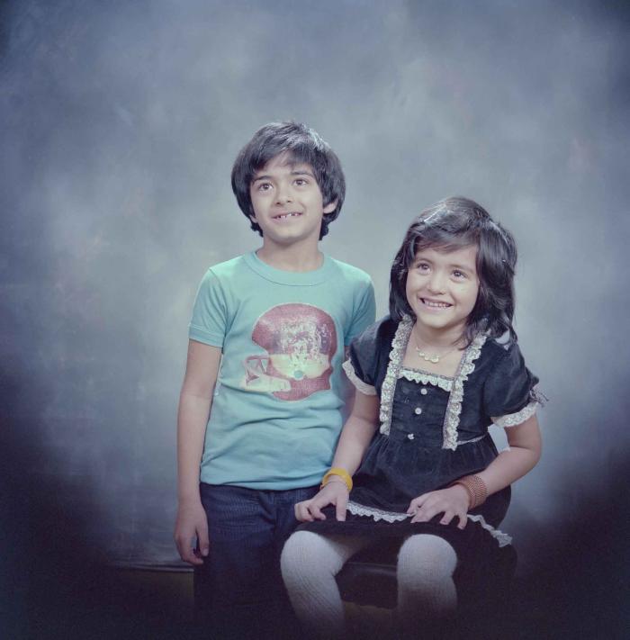 [Group portrait of Pala and Harpal Gill]