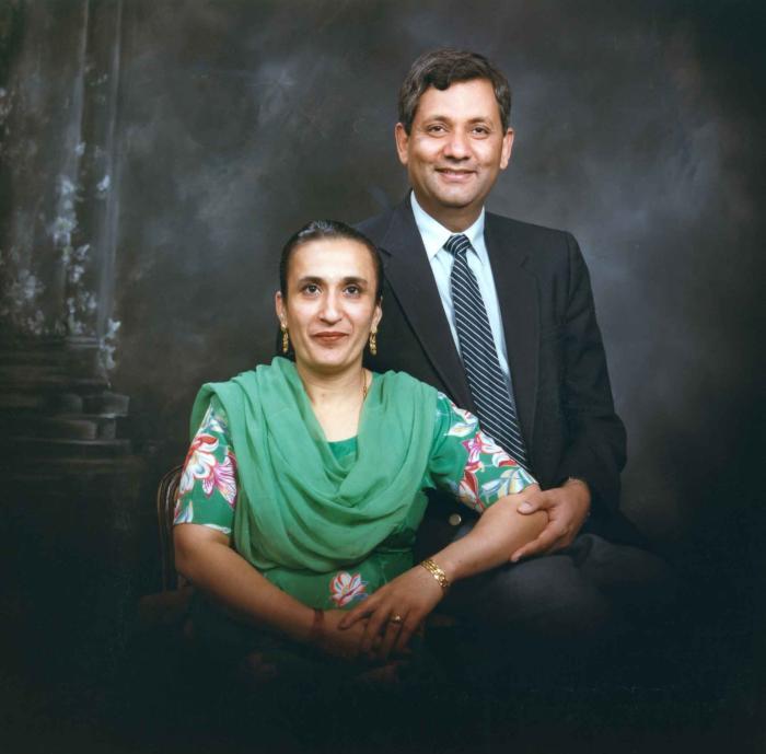 [Group portrait of Paul Gill and an unidentified woman]
