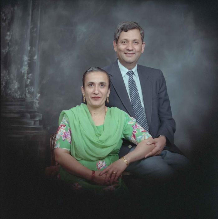 [Group portrait of Paul Gill and an unidentified woman]