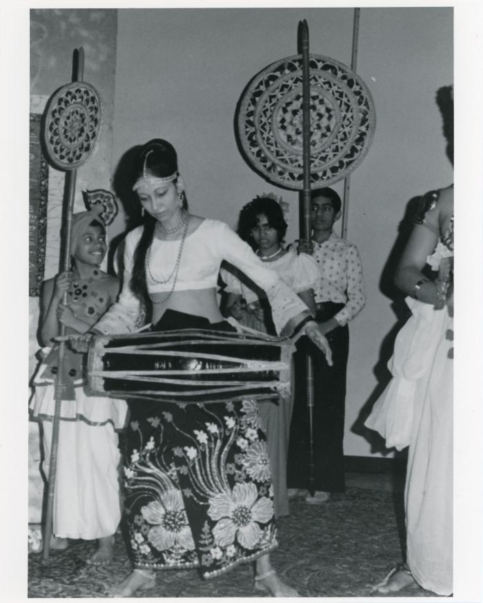 [Photo of Kandyan dance and music performance]