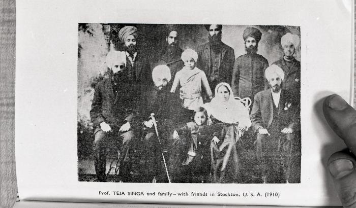 [Page from a book with a photo of Teja Singh and family]