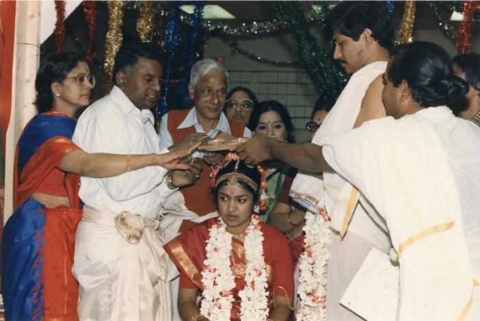 [Photo of a Tamil wedding ceremony]