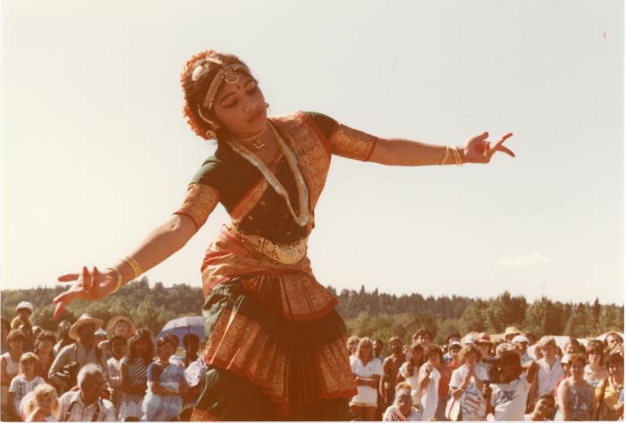 [Photo of a Bharatanatyam dancer]