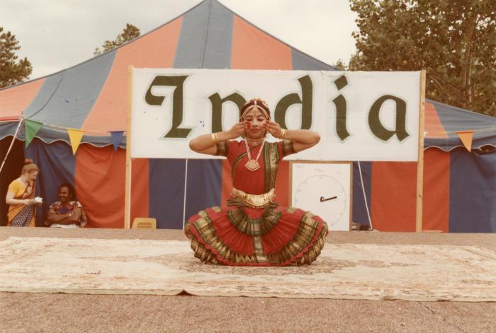 [Photo of a Bharatanatyam dancer]