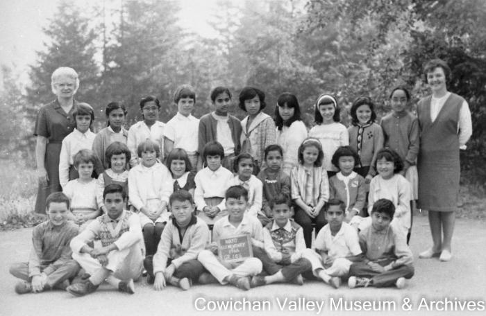 [Group of unidentified school children and teachers at Mayo School posing for class portrait]