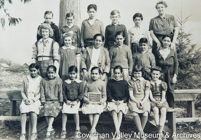 [Group of unidentified school children and teacher at Mayo School posing for class portrait]