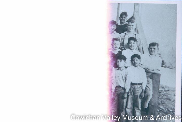 [Group of unidentified school children and teacher at Mayo School posing for class portrait]