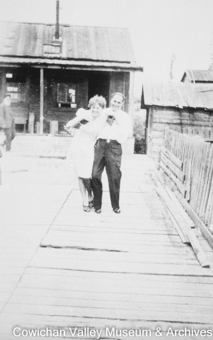 [Kishen Singh Parhar and unidentified woman on Paldi boardwalk]