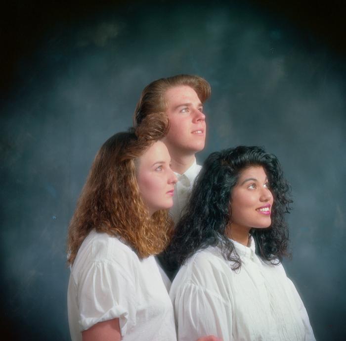 [Portrait of Nindee Ahuja and two unidentified students]