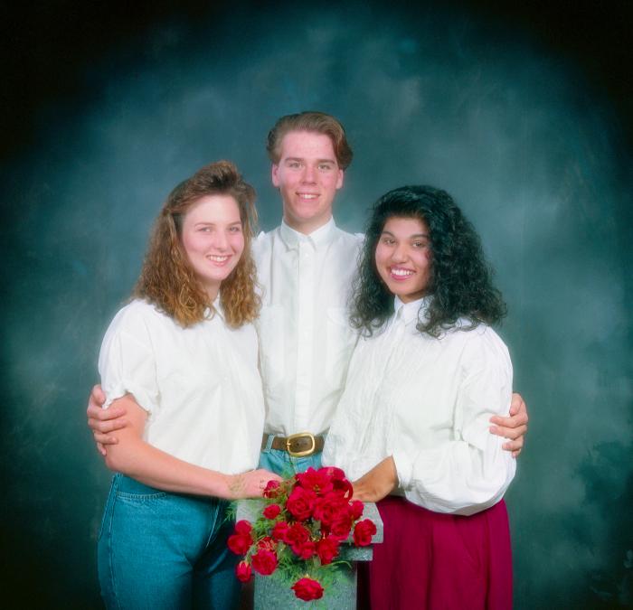 [Portrait of Nindee Ahuja and two unidentified students]