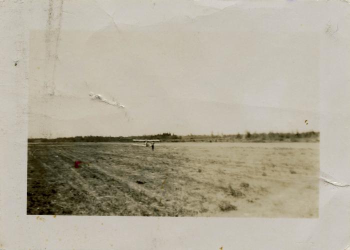 [Jiginder Singh Johl's plane in field]
